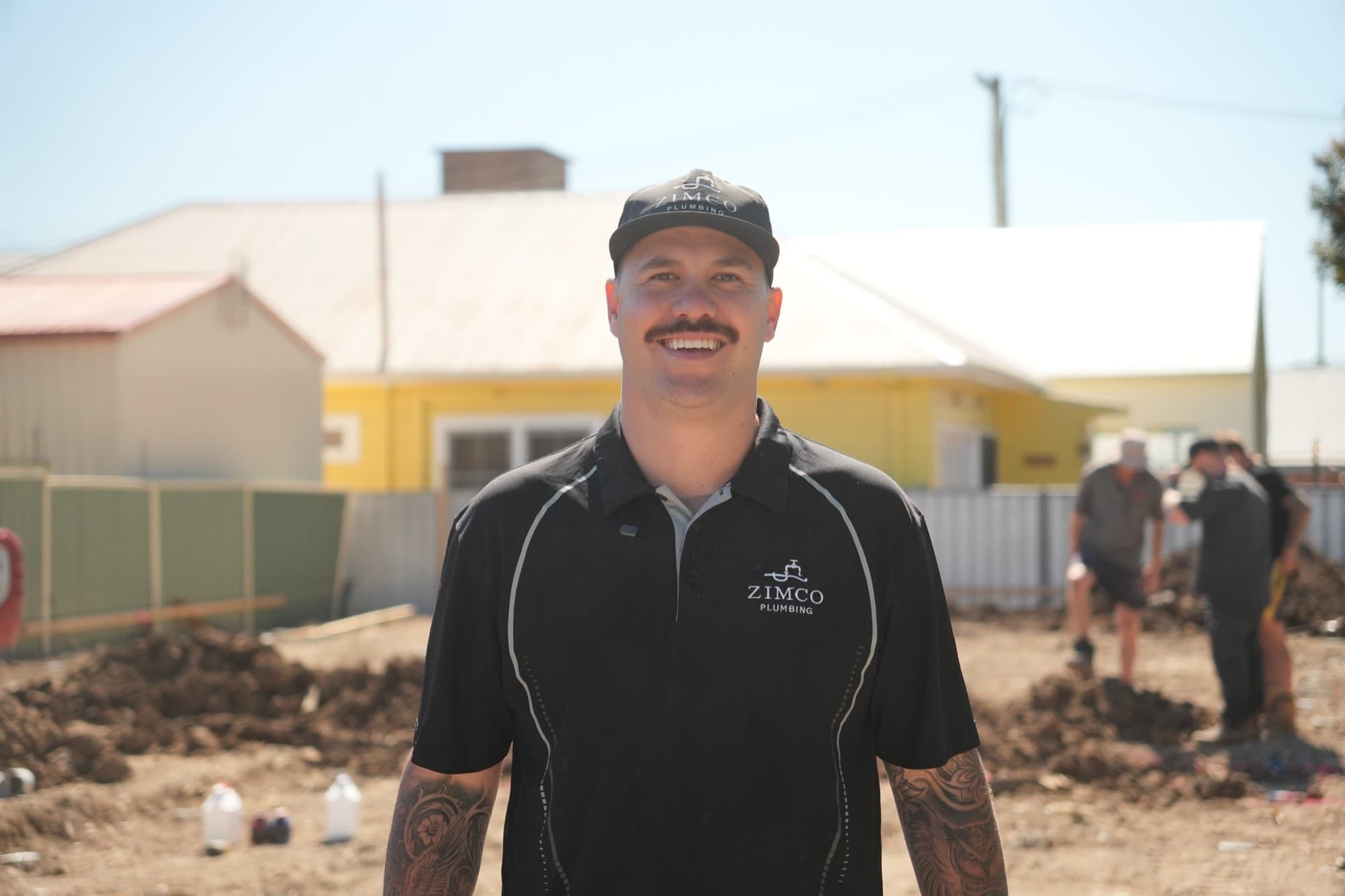 Zac Adams, owner of Zimco Plumbing, on a job site