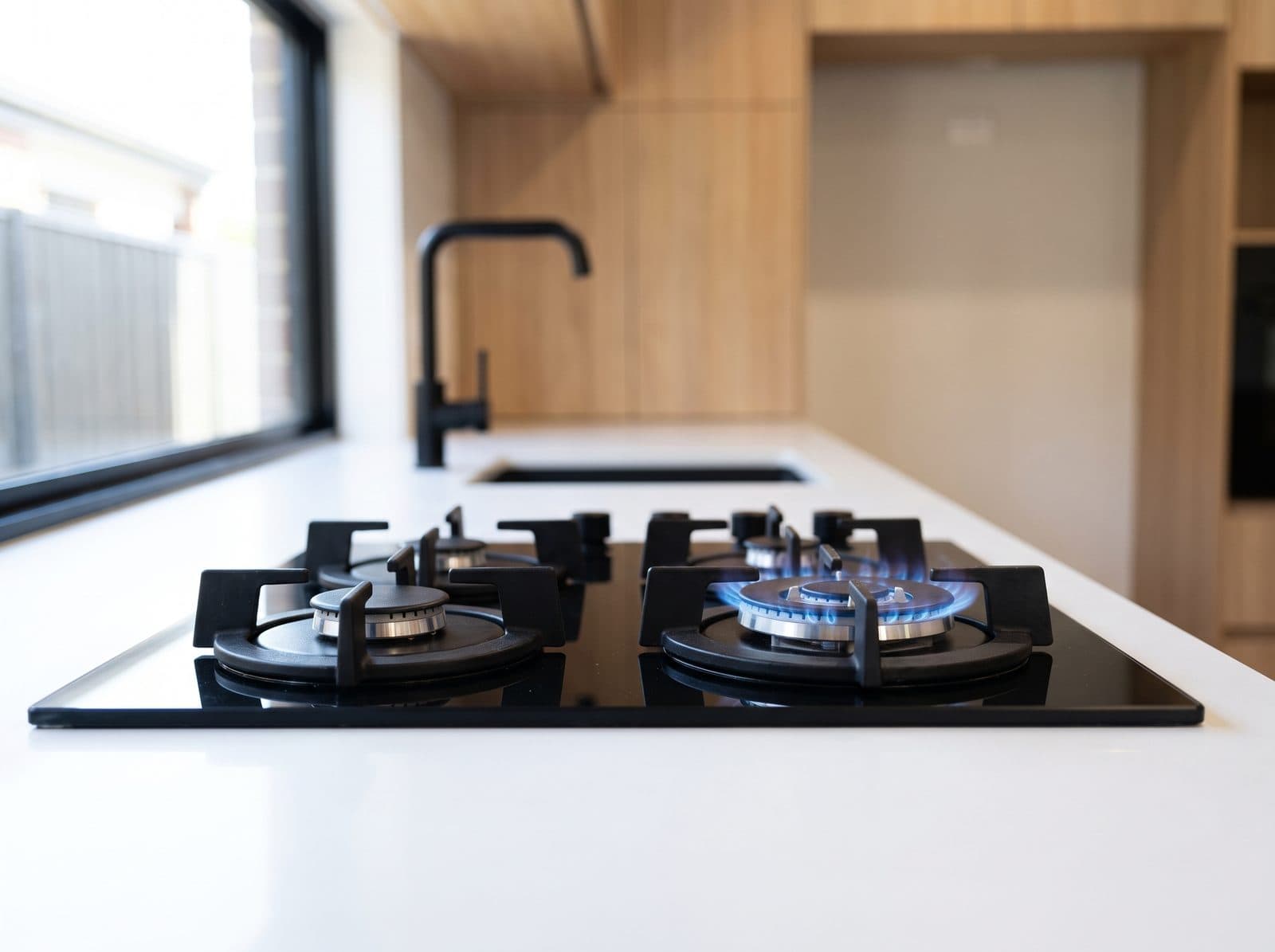 Newly installed gas cooktop in a modern kitchen